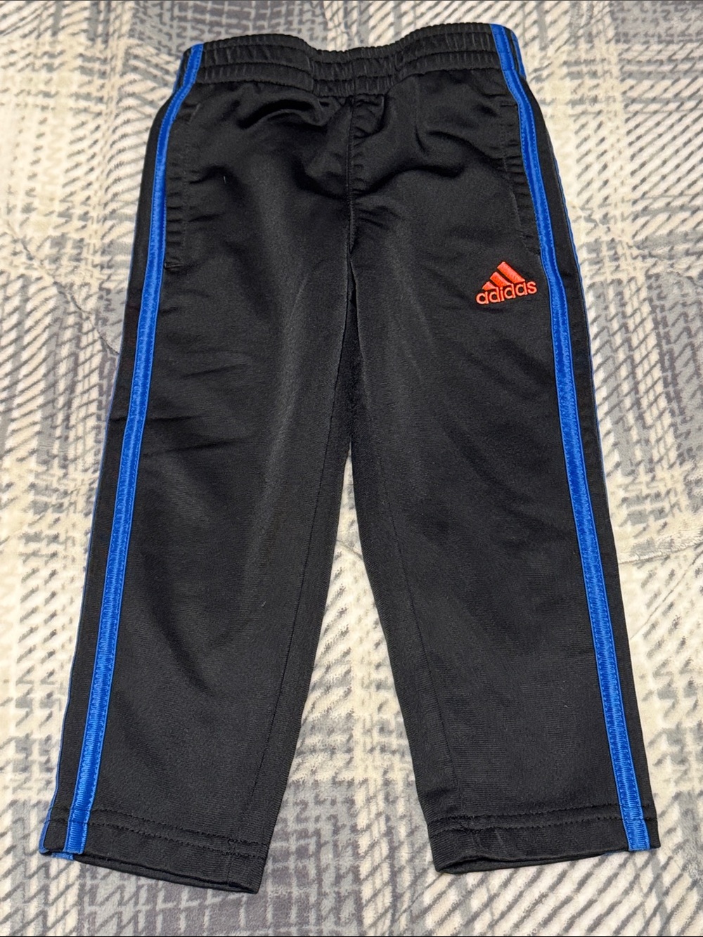 adidas Kids Black Joggers with Blue Side Stripes and Bright Logo
